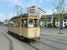 Tw134 (Bj 1904) an der H Theater am Leipnizpl, Fahrtrichtung Flughafen