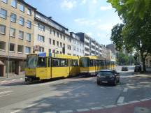 Zugbegegnung auf der Kaiserstr Ecke Adolfstr (links Wagen der EVAG, rechts MVG)